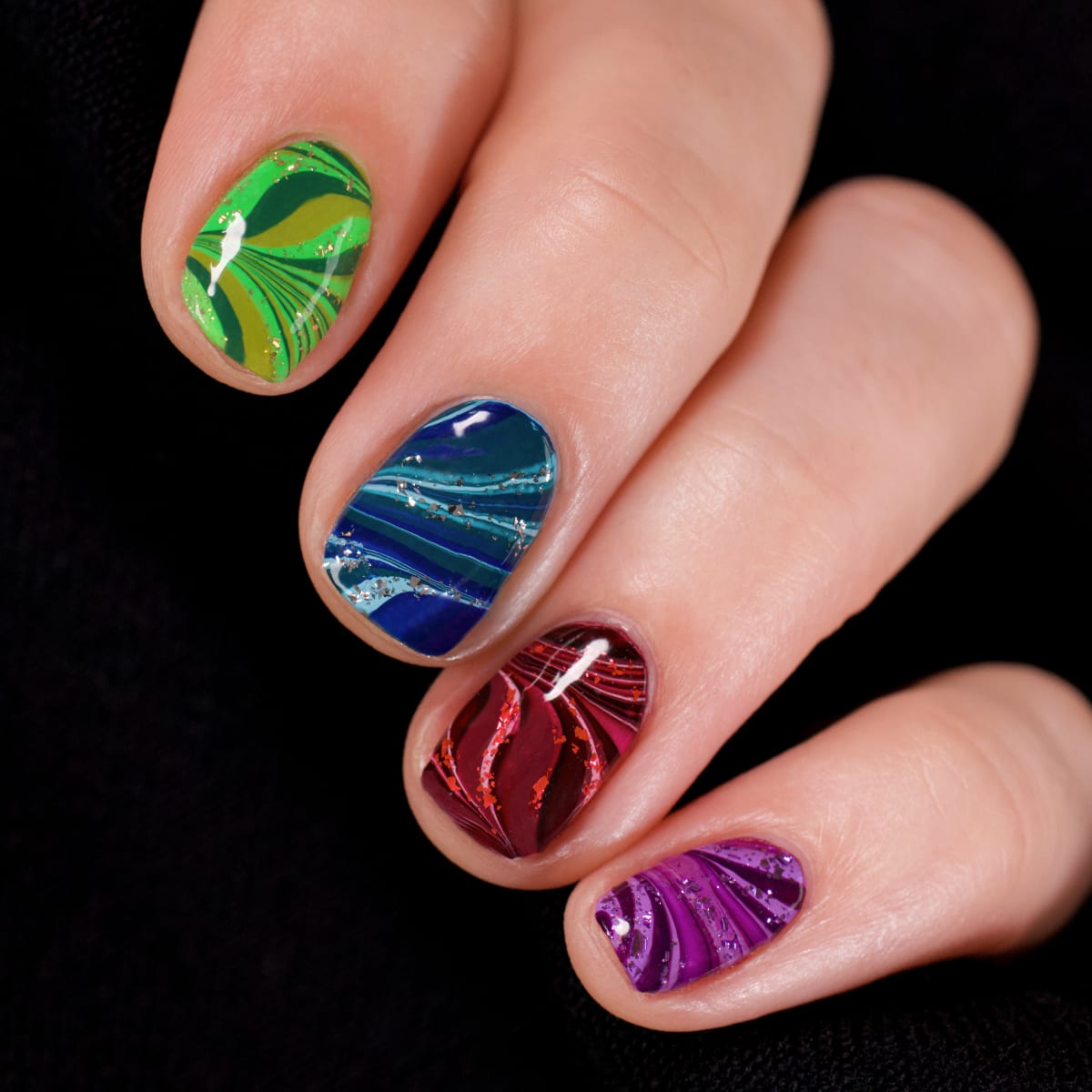 Watermarble skittle cream topper nail art