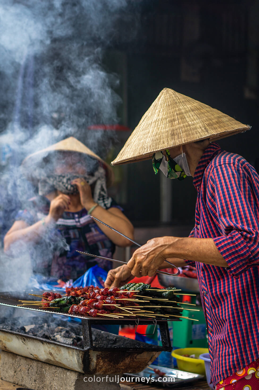 Women prepare food in Vietnam