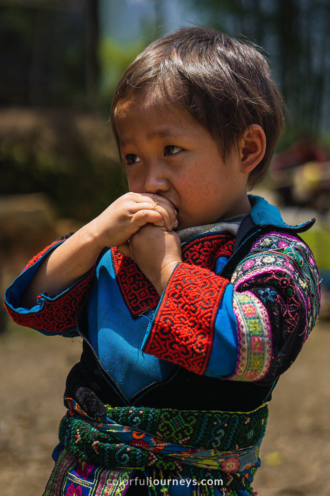 A young boy wears traditional clothes in Northern Vietnam.