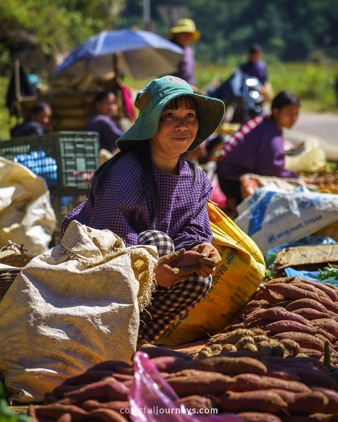 Women sell goods at the road in Cao Bang, Vietnam