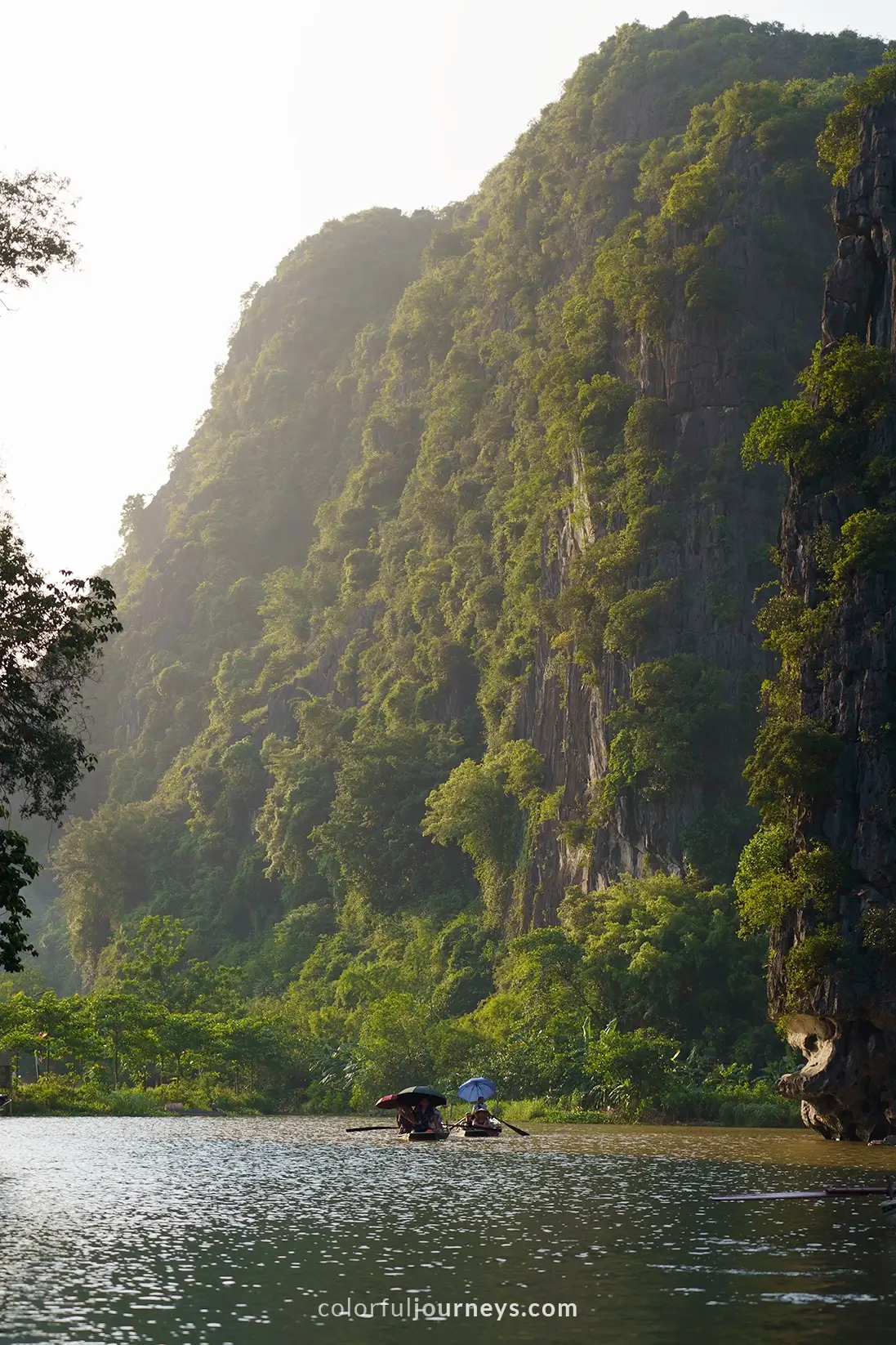 Boats on a river in Tam Coc, Vietnam