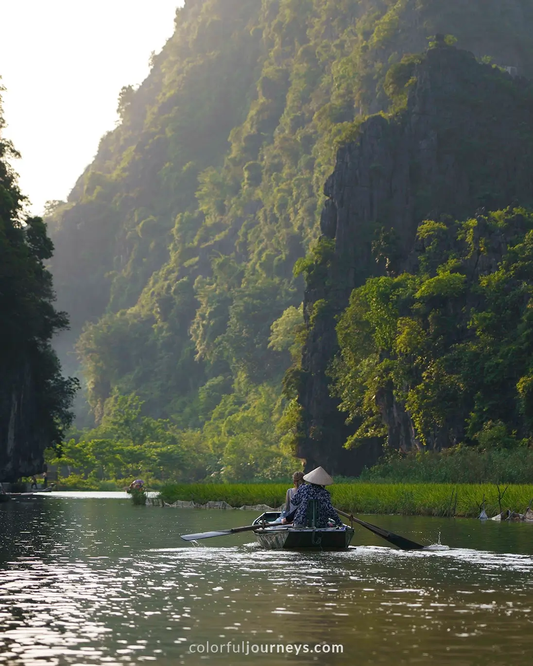 Boats on a river in Tam Coc, Vietnam