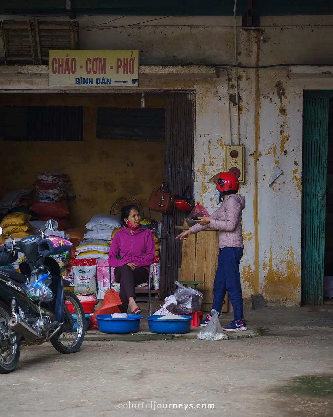 Vendors at a market in Vietnam