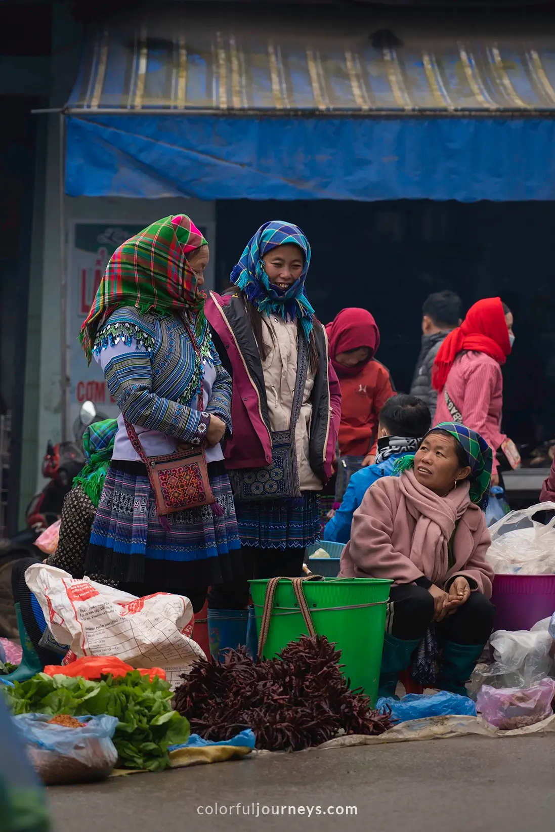 Women selling goods at Bac Ha market, Vietnam