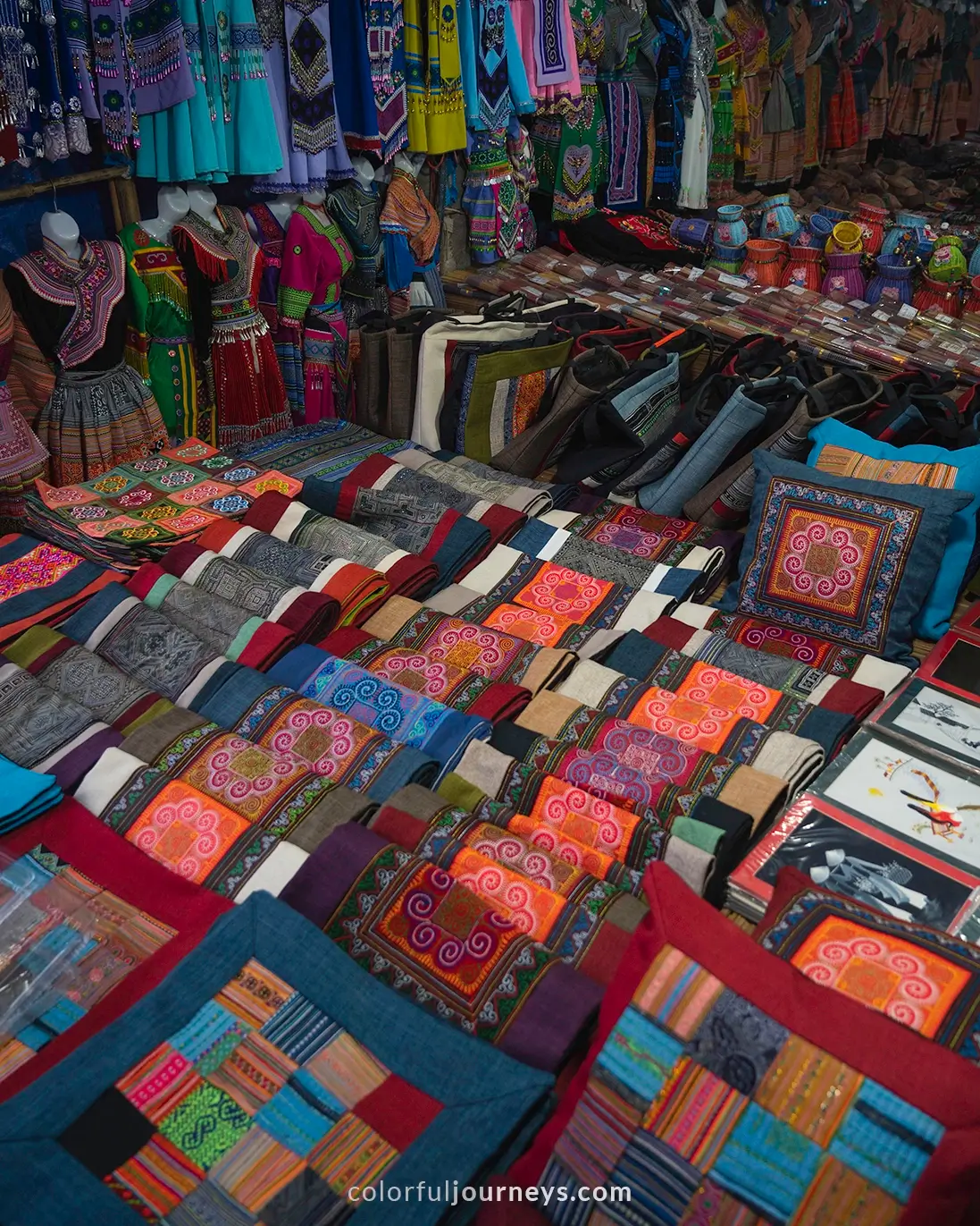 Souvenirs and textiles being sold at Bac Ha market, Vietnam