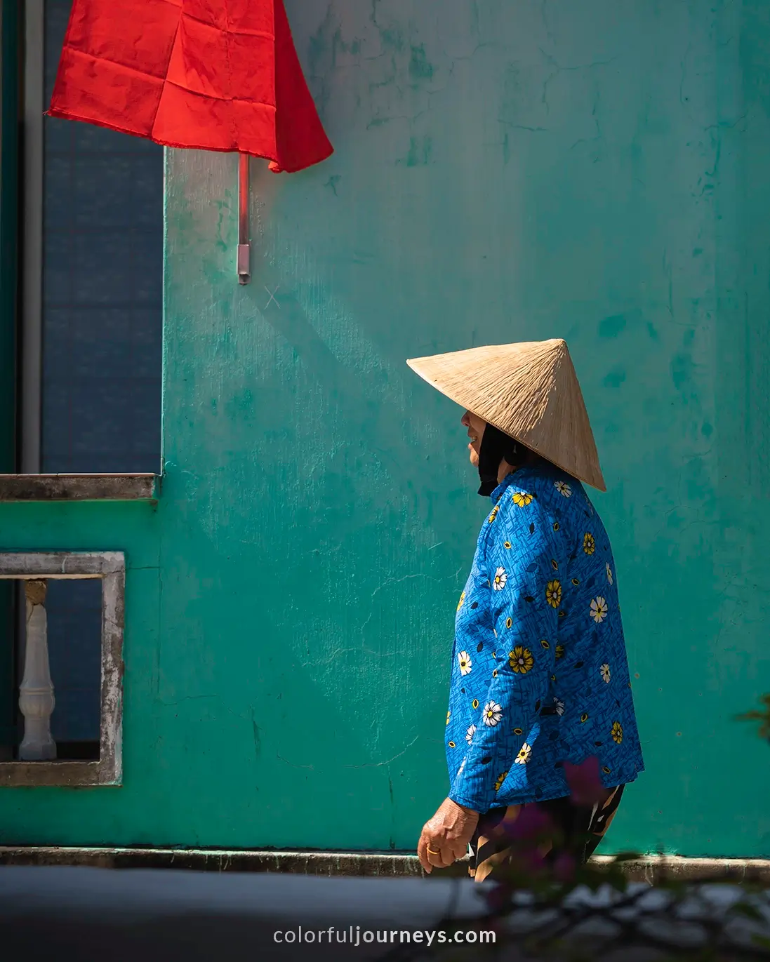 A woman wearing a conical hat in Quy Nhon, Vietnam