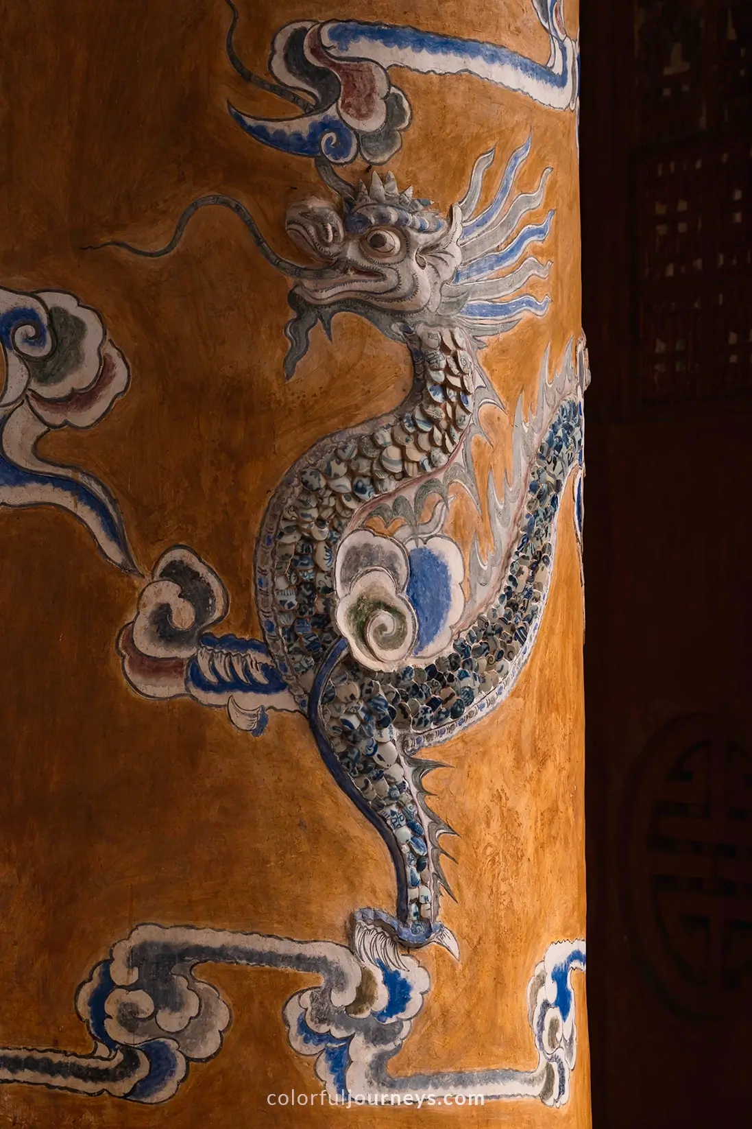 Murals of dragons at the Tu Duc tomb complex in Hue, Vietnam