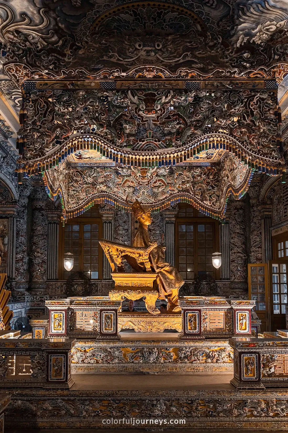 The intricate decorated interior of Khai Dinh Mausoleum complex in Hue, Vietnam