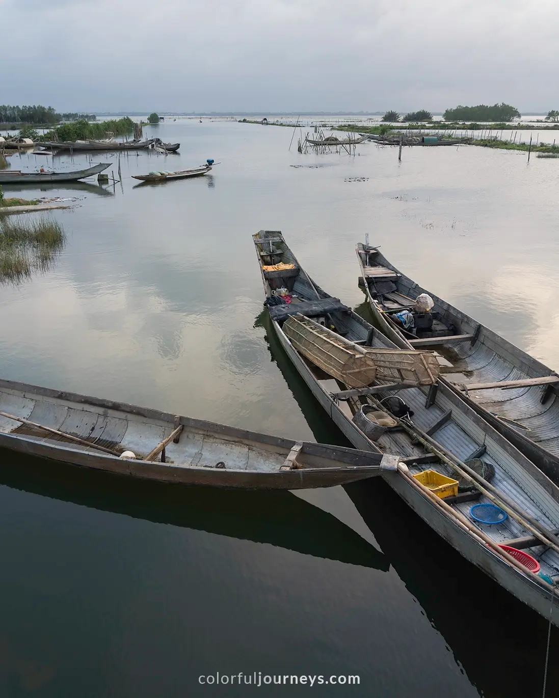 Wooden boats at Tam Giang lagoon in Hue, Vietnam