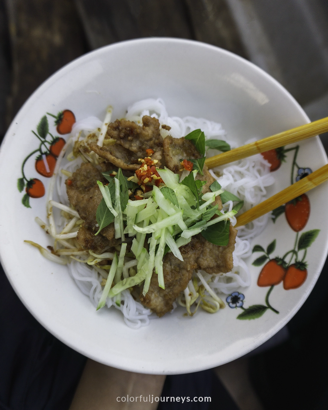 A bowl of noodles with grilled pork at the Long Xuyen Floating Market in Vietnam