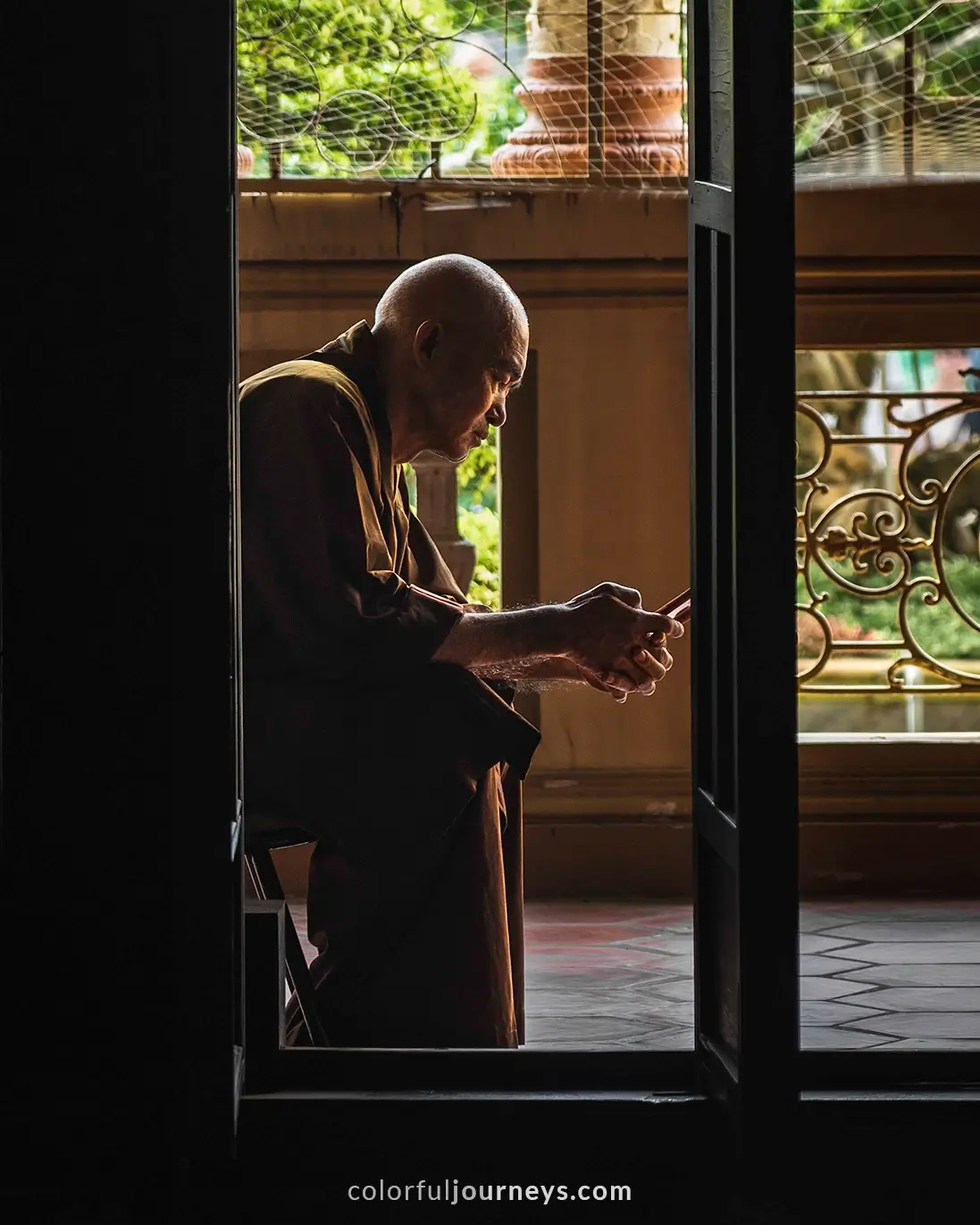 A monk at the Vinh Trang pagoda in My Tho, Vietnam