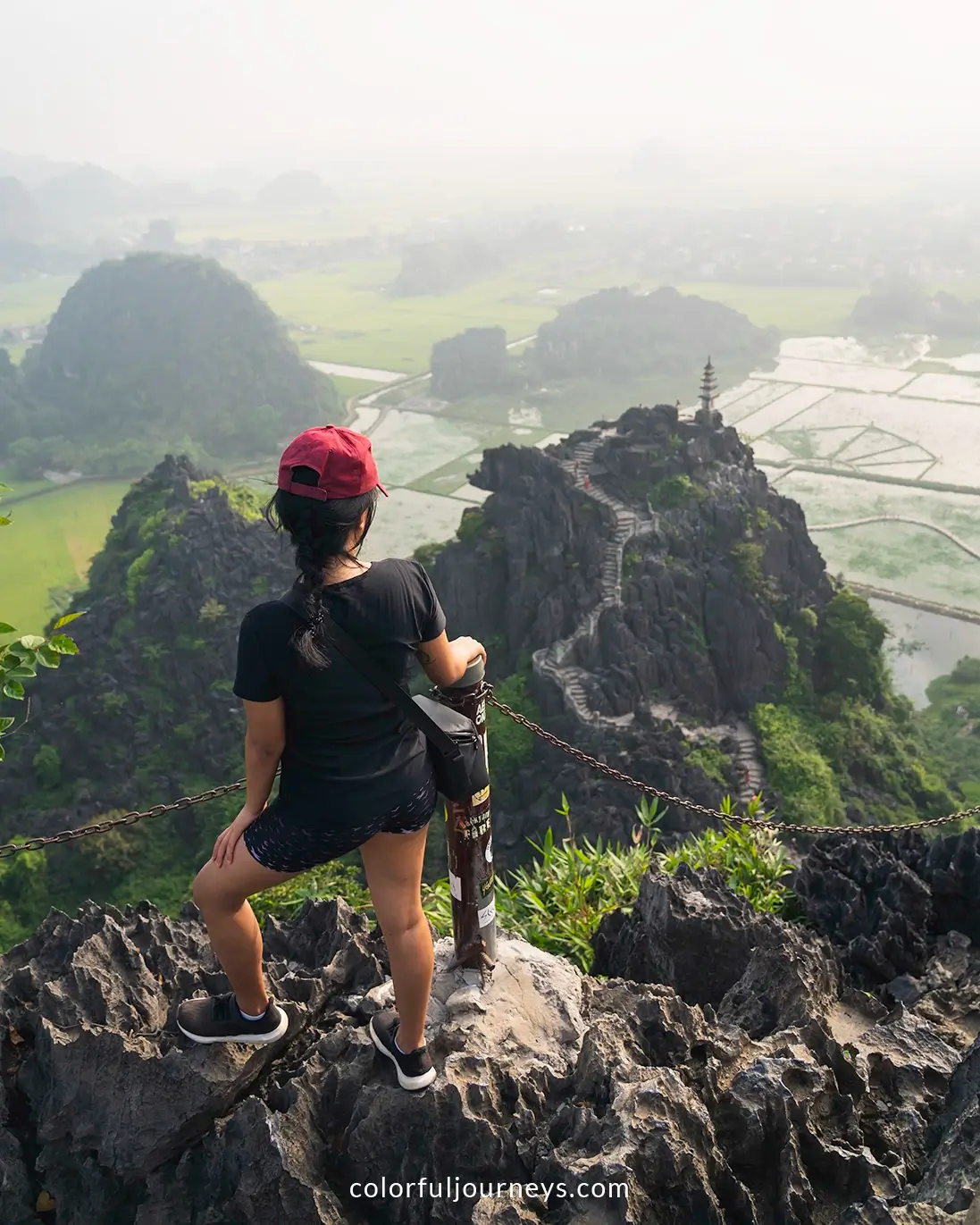 A woman enjoys the view from Hang Mua viewpoint in Ninh Binh, Vietnam