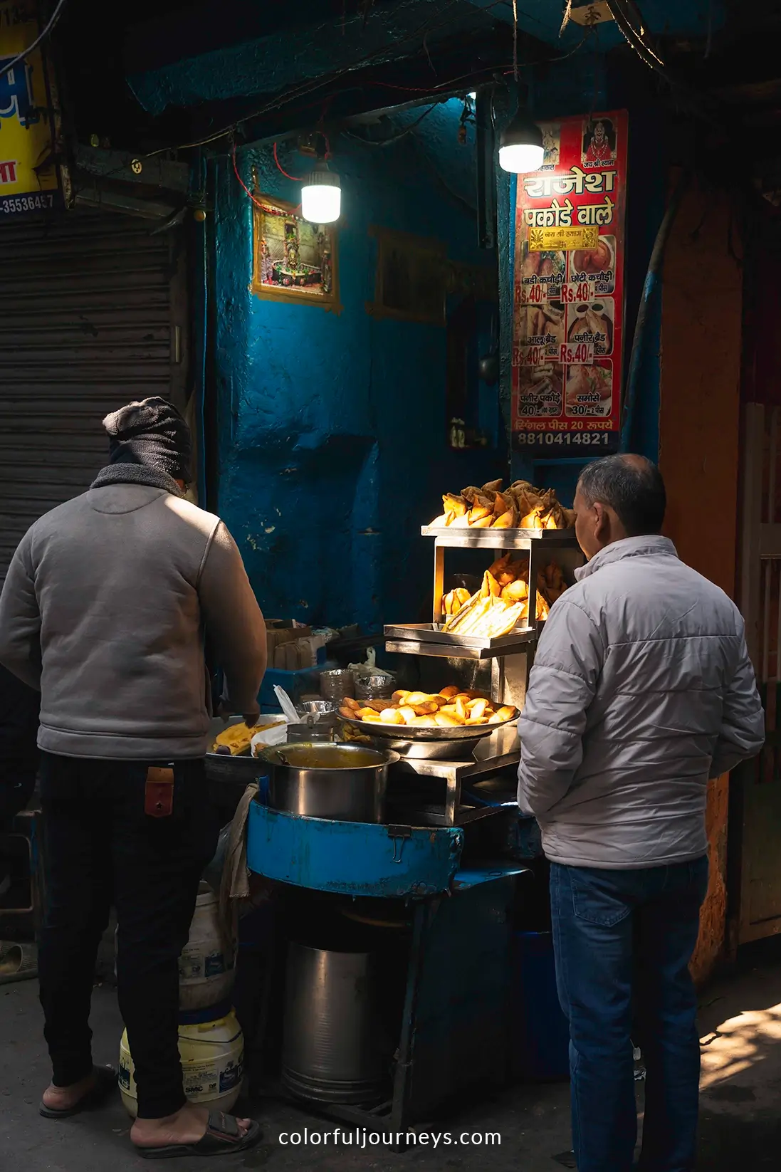 Men sell food on the streets in Delhi, India