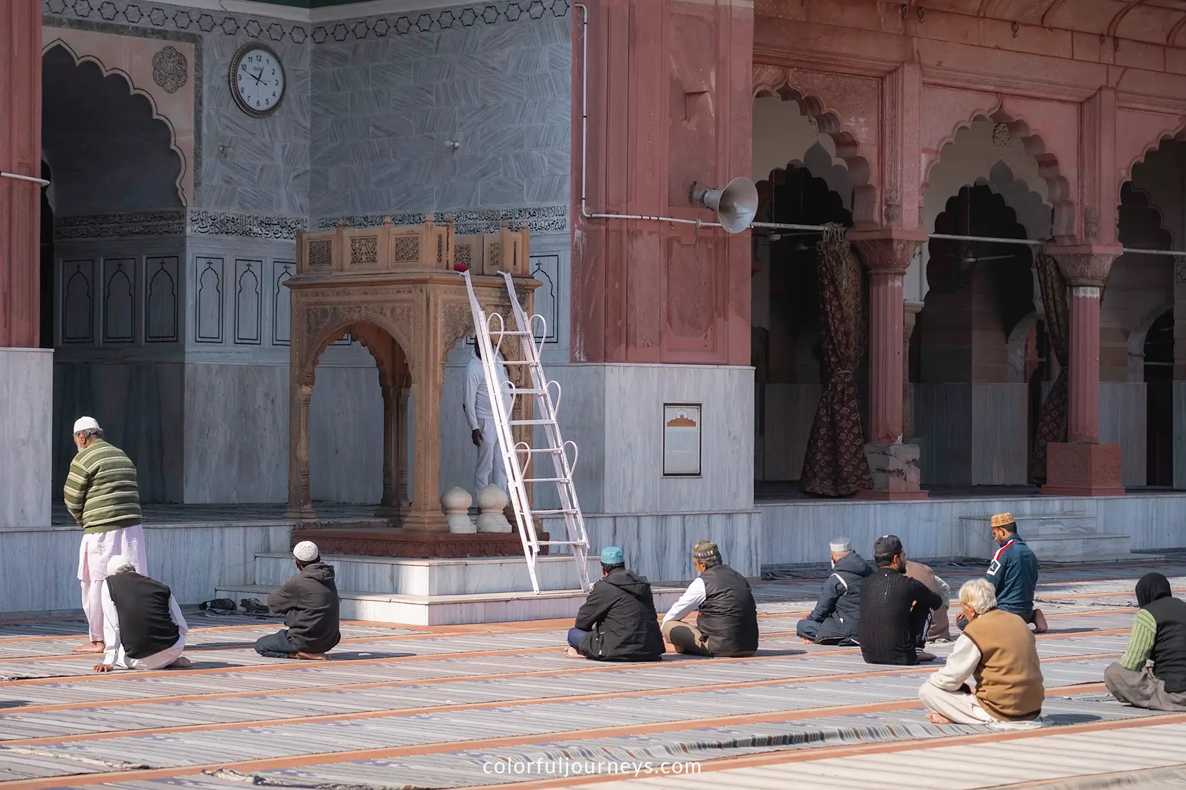 Men pray at Fatehpur Masjid in Delhi, India