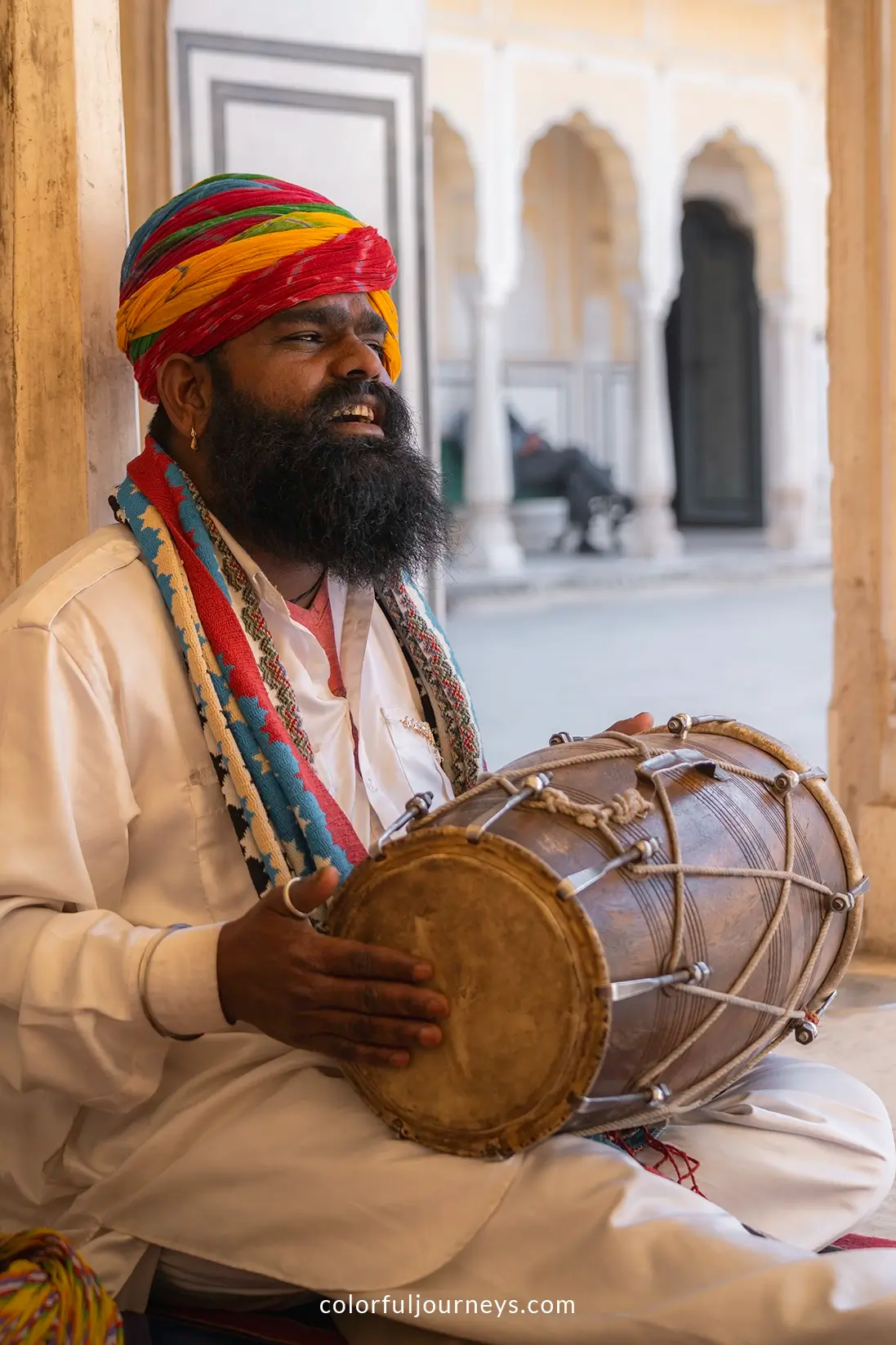A man performs at the Hawa Mahal in Jaipur, India