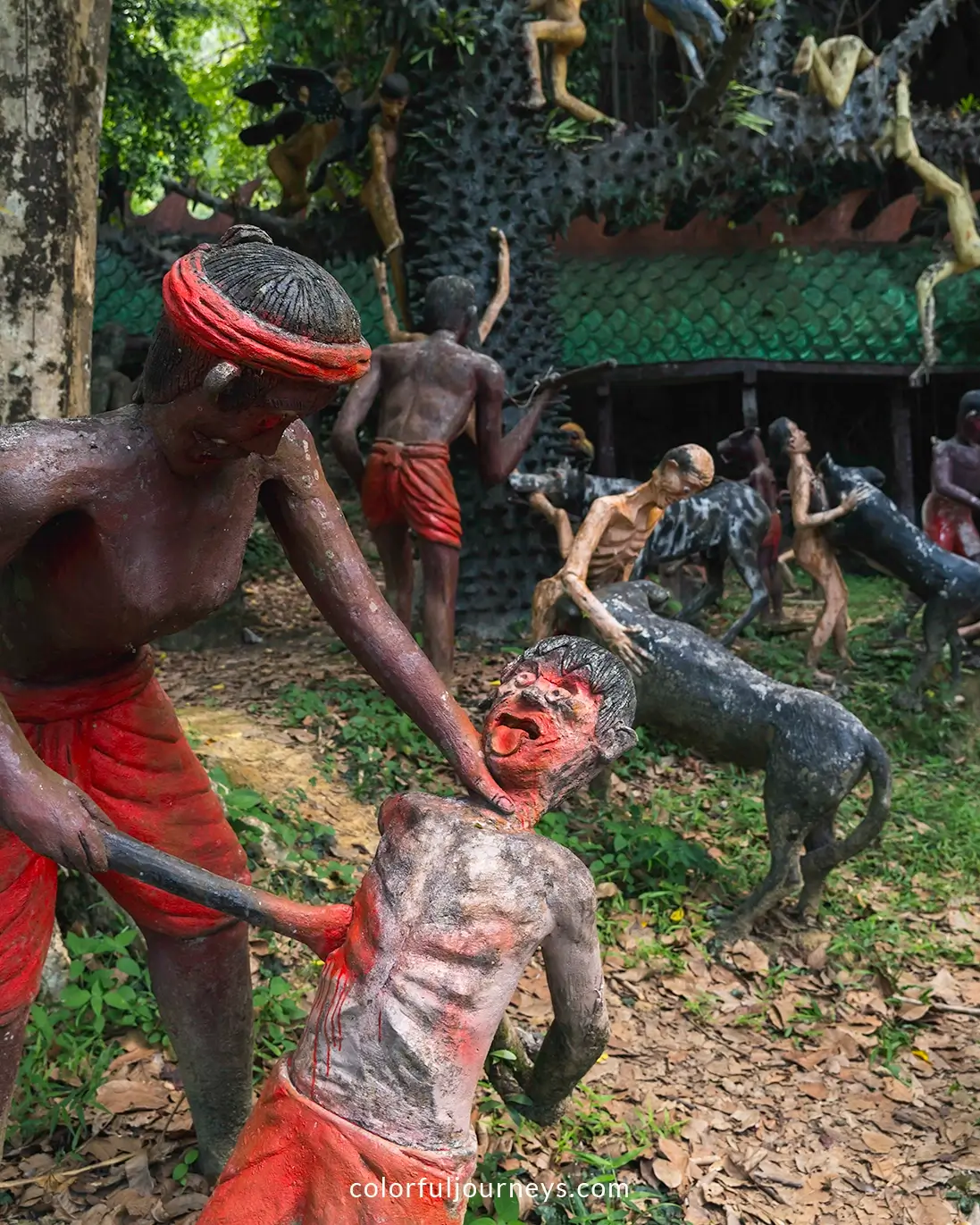 Unsettling statues depicting Hell at a temple in Phang Nga, Thailand