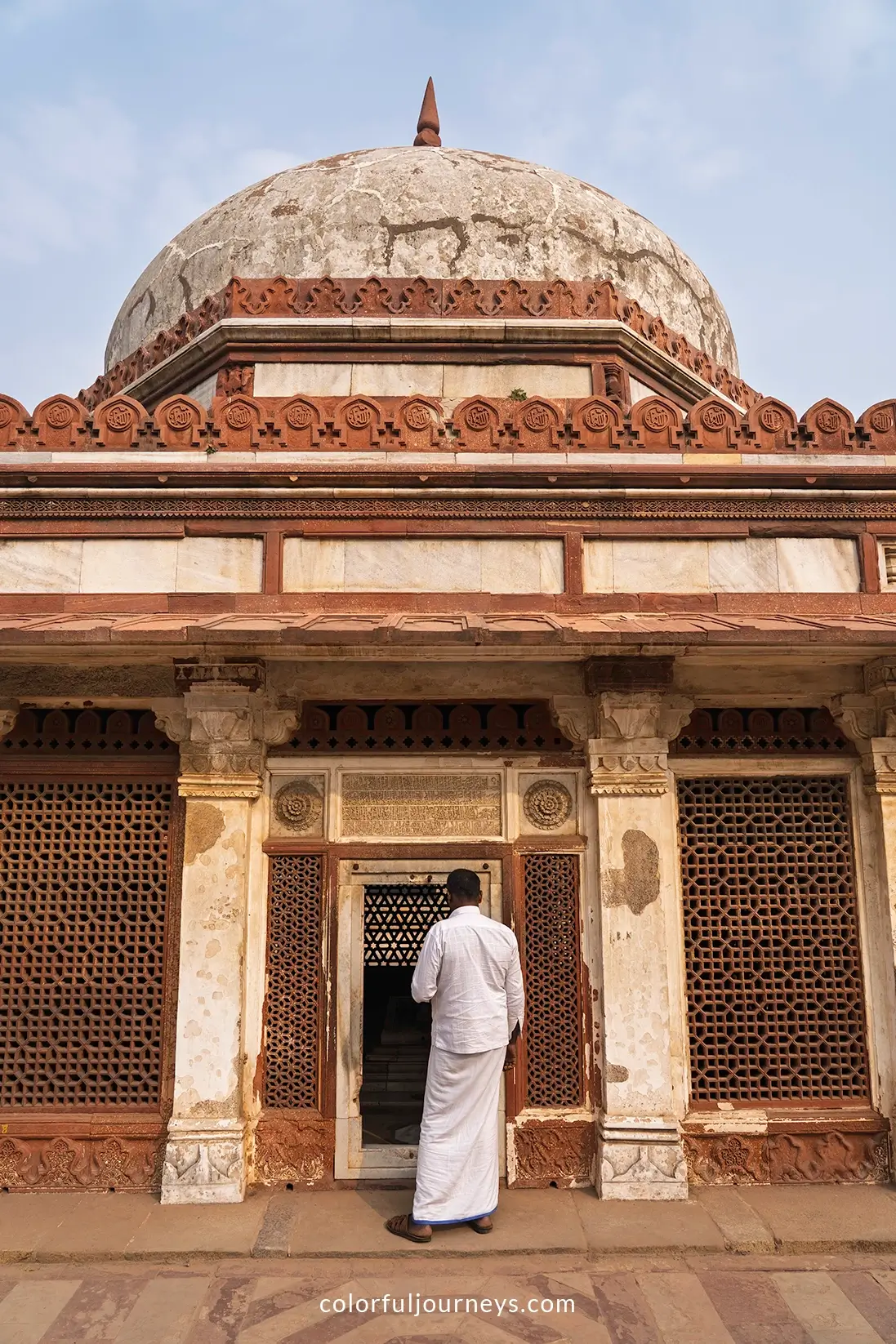 A man in front of Imam Zamin's Tomb at Qutub Minar, Delhi