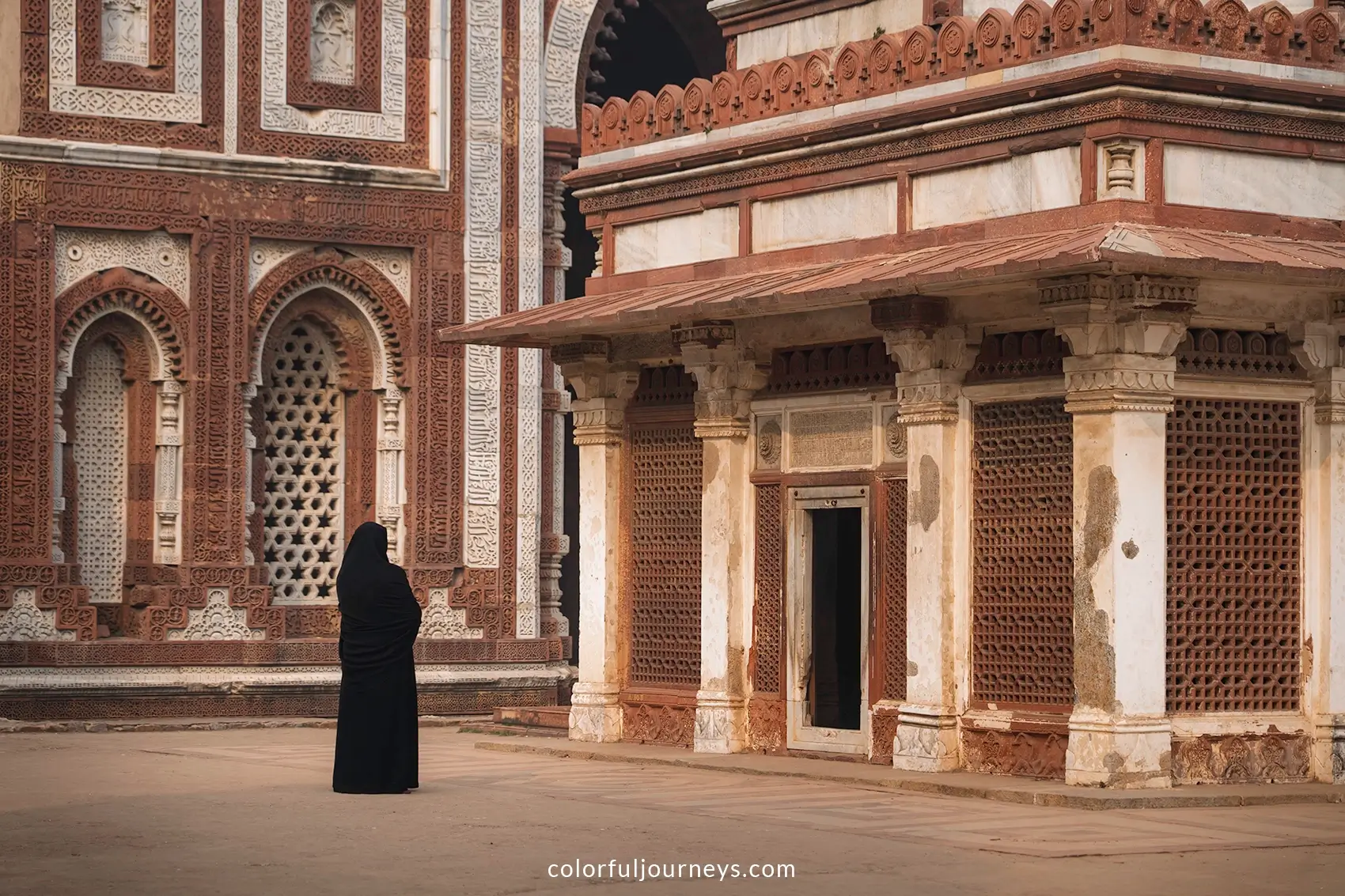 A woman in front of Imam Zamin's Tomb at Qutub Minar, Delhi