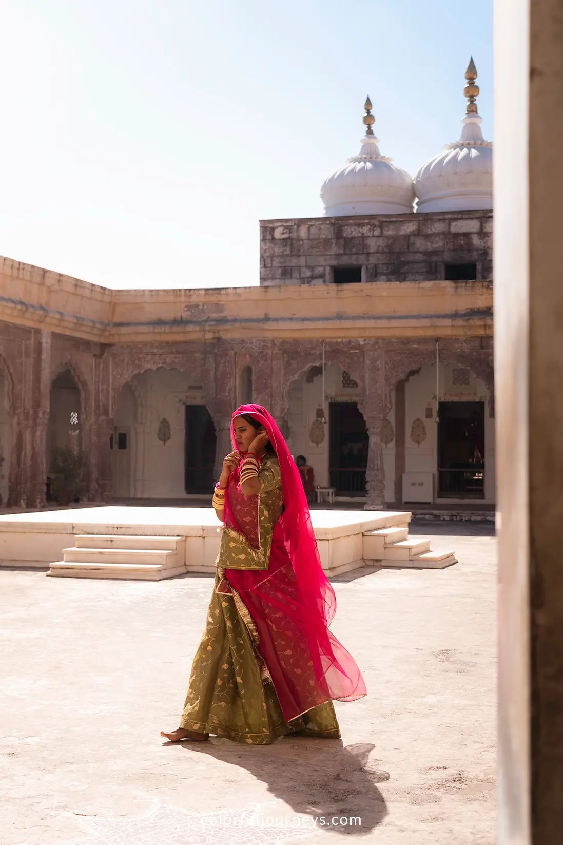 A woman wearing a Sari at Mehrangarh Fort in Jodhpur, India