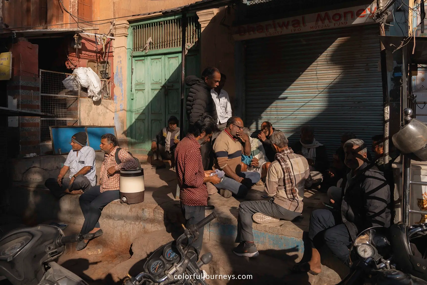 Men hang around on the streets of Jodhpur, India