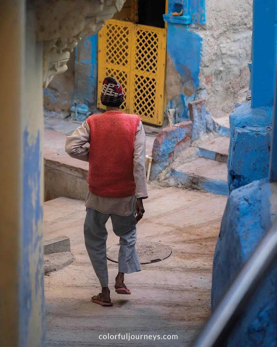 A man walks the streets of  Jodhpur, India