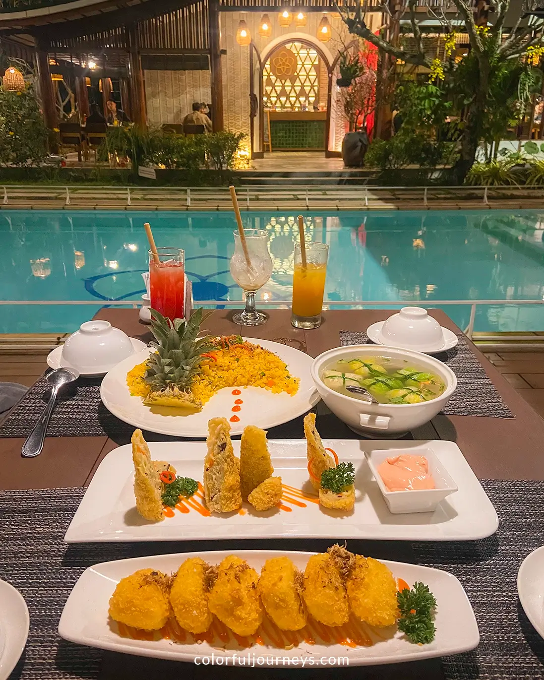 Food next to a swimming pool in Hue, Vietnam