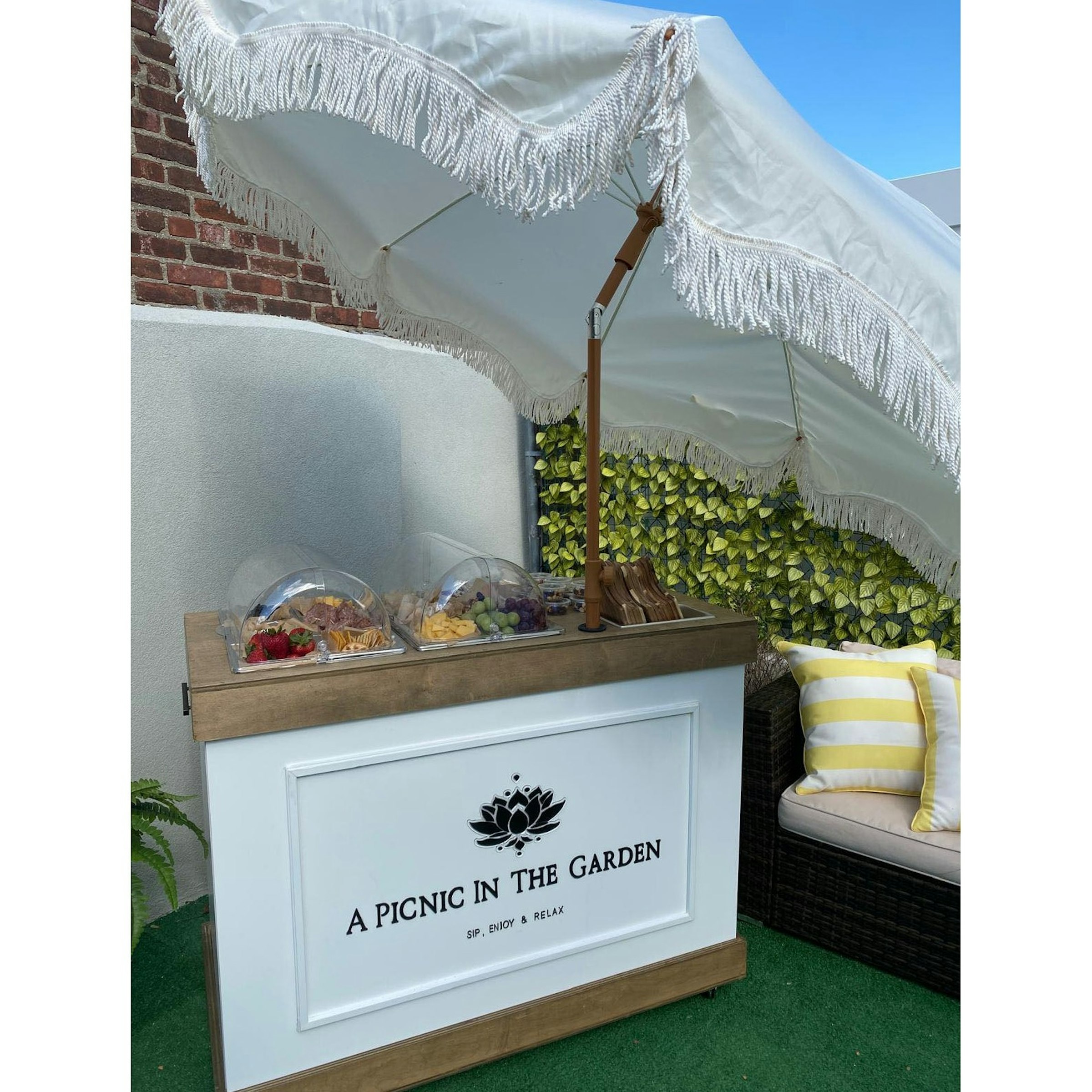 White Mobile Snack/Bar Cart with Fringed Umbrella