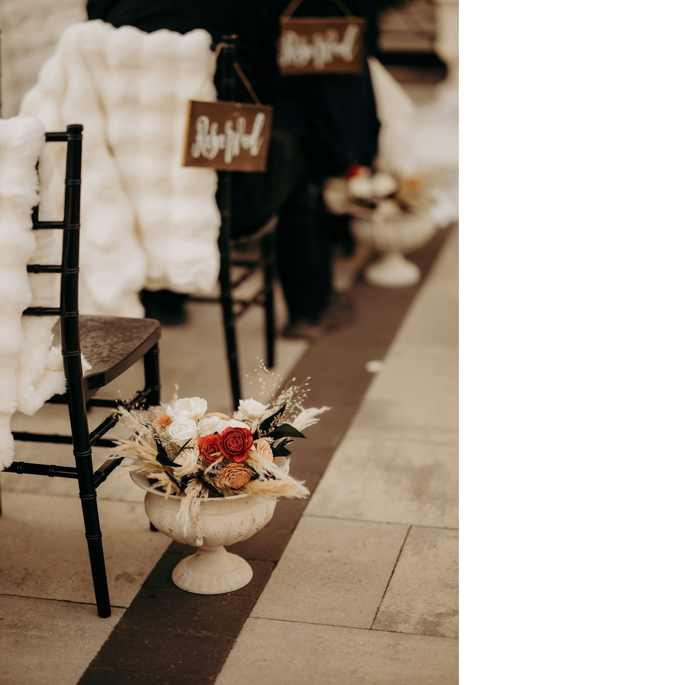 Distressed White Urn with Faux Floral Arrangement