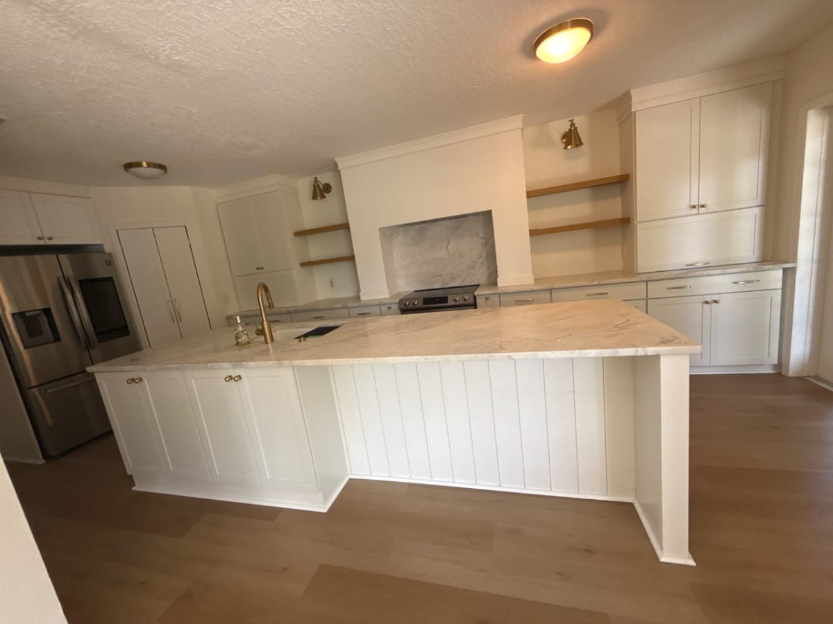 Clean modern island kitchen cleaned by Blue Bin Crew