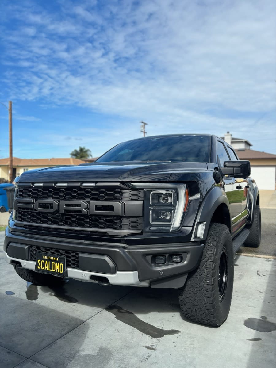 Ford Raptor front detail - black exterior gleaming