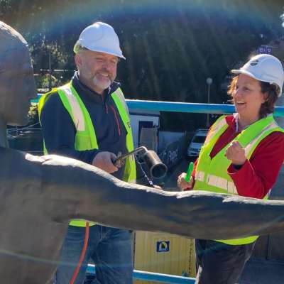 Conservators inspecting the monument 
