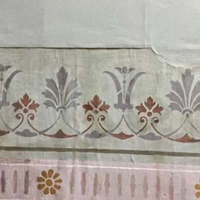 During treatment- Details showing the stains and the paper putty fills