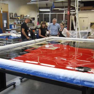 During treatment- washing the tapestry