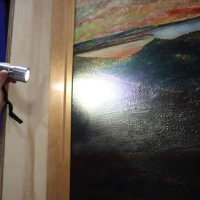 Conservators carrying out photodocumentation and condition assessment