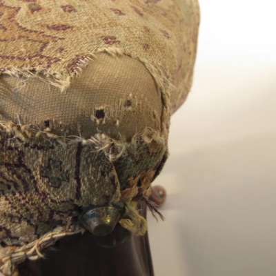 Before treatment: Details of damaged upholstery