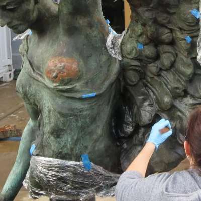 During treatment- conservator at work