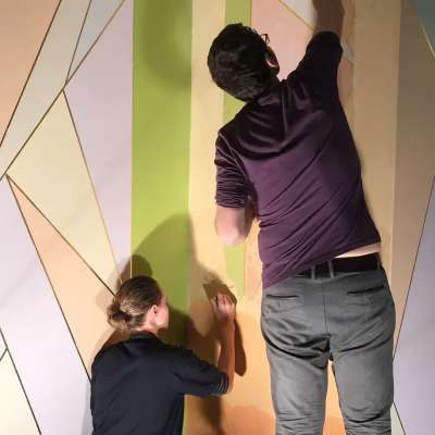 During treatment- conservators at work