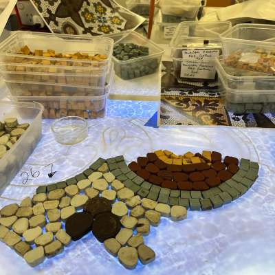 Laying of the gothic mosaic