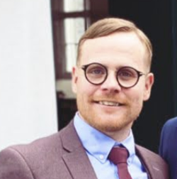 The portrait of Ciaran Griffin, Deaf Full-stack Software Developer.