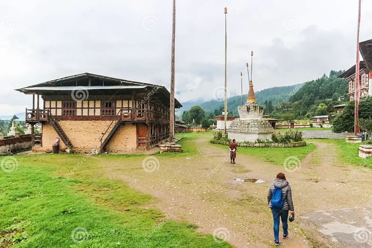 Sacred temple courtyard in Bumthang beneath prayer flags