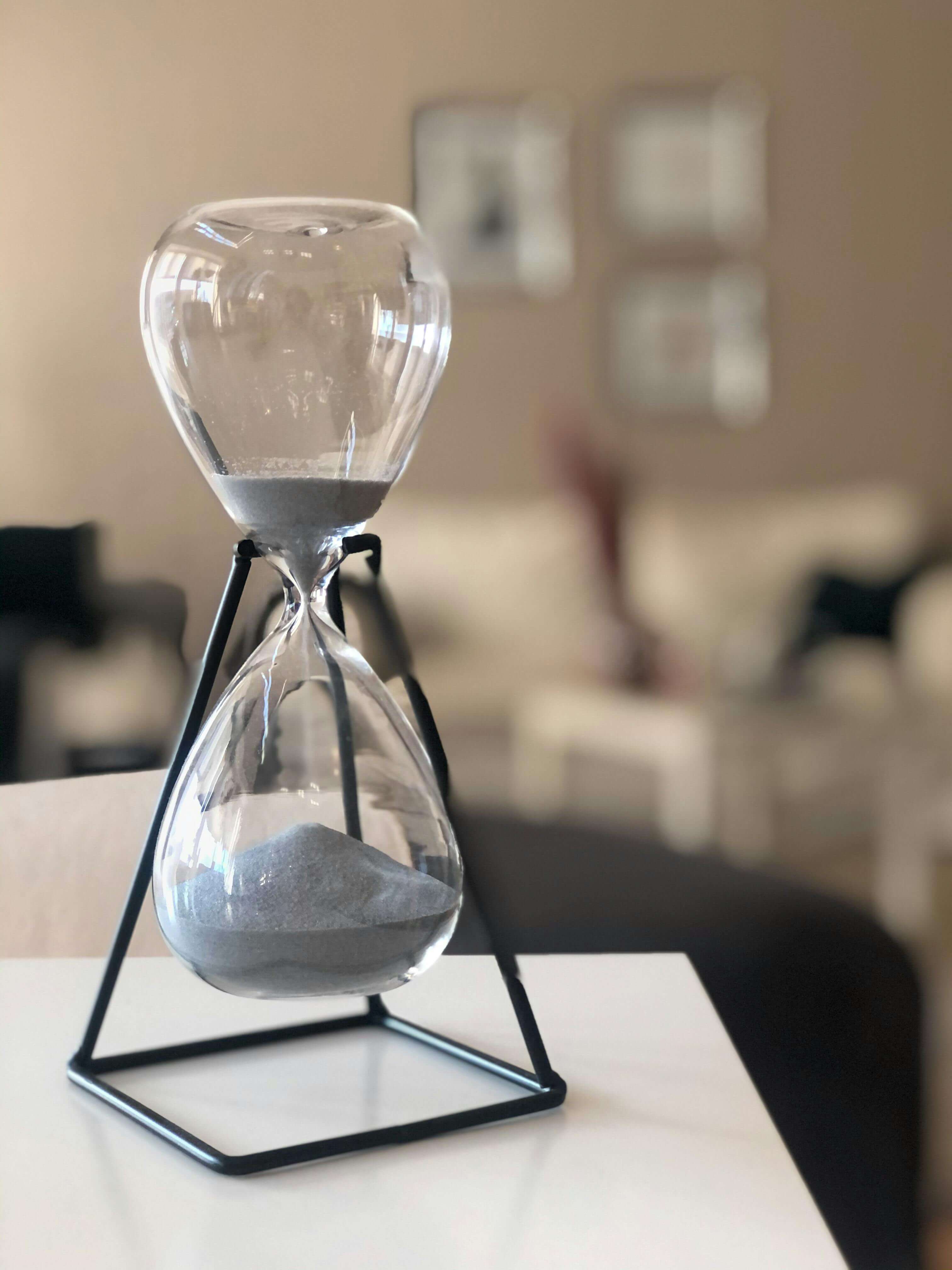 Hourglass timer representing the passage of time and memory decay.