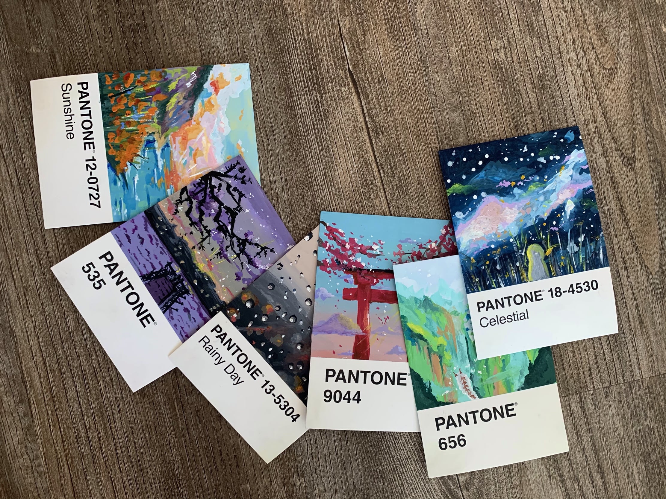 nature scenes painted onto pantone postcards