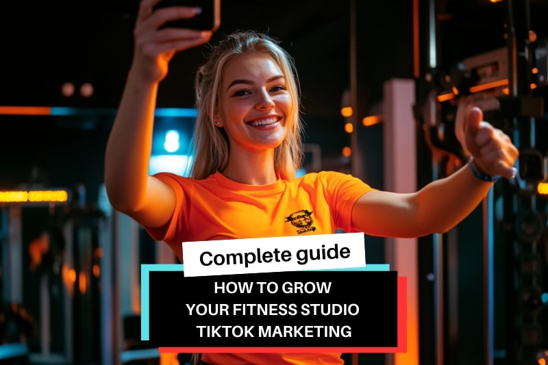 A smiling woman filming herself in a fitness studio for TikTok Marketing