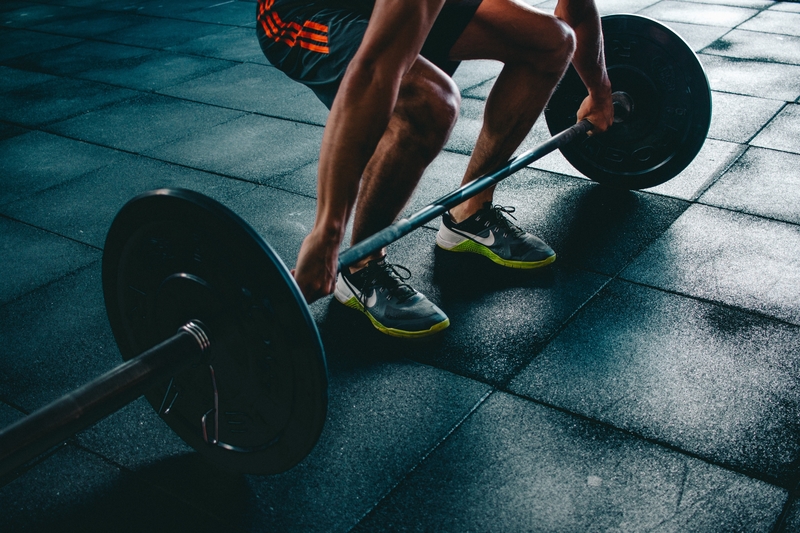 man doing  a deadlift