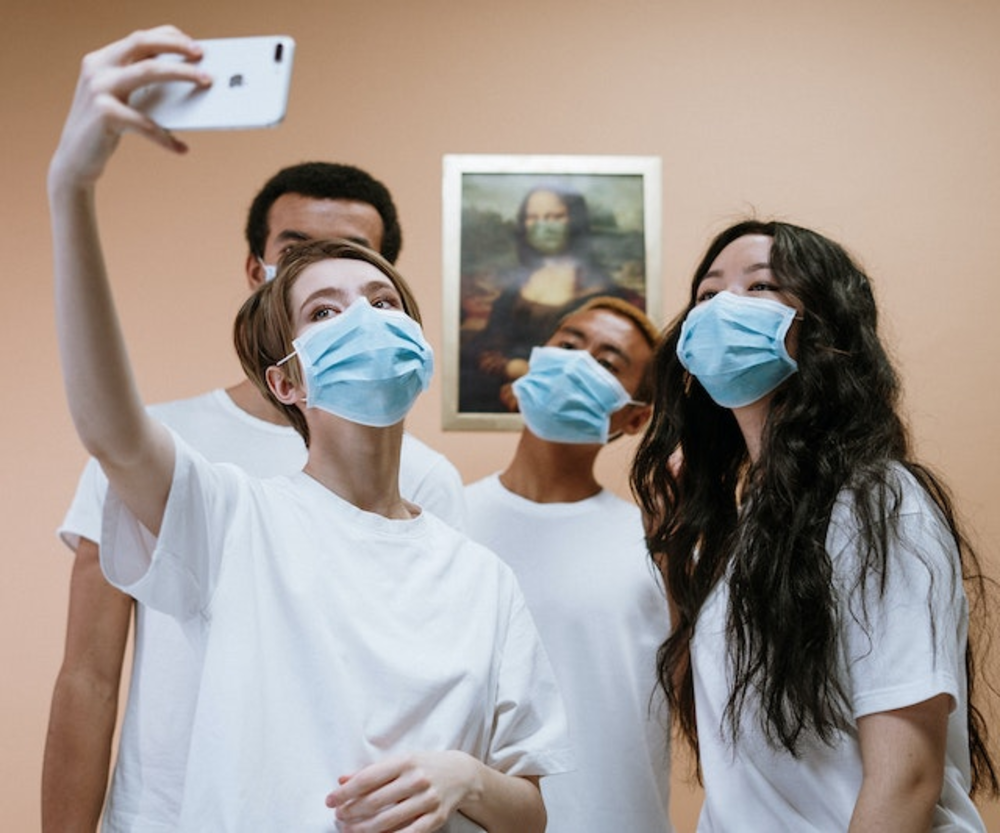 A group of people taking a selfie