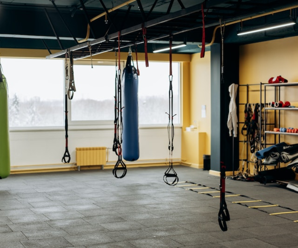 A Spacious Gym With Tools And Equipments