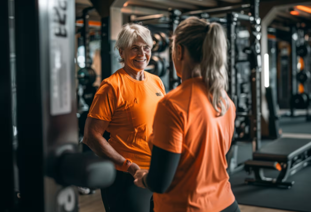 Personal trainer and client having a personal training session for long term success