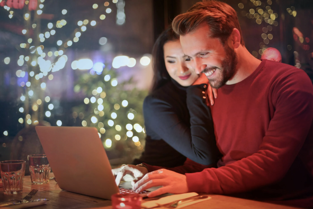 A couple look at black friday deals to create a home gym equipment