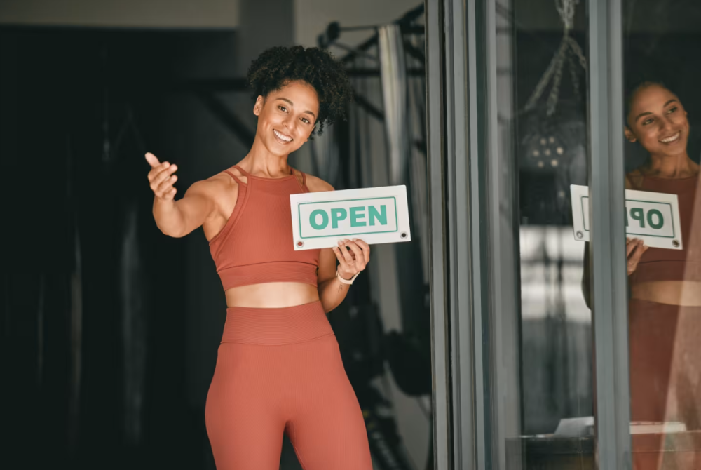 A gym owner gives her personal touch by welcoming new members to their first class