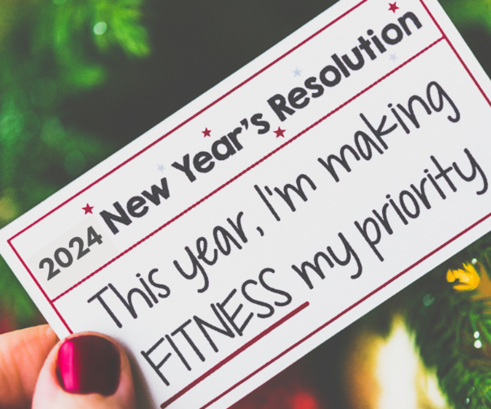 A close-up of a card that reads, "2024 New Year’s Resolution: This year, I’m making FITNESS my priority.